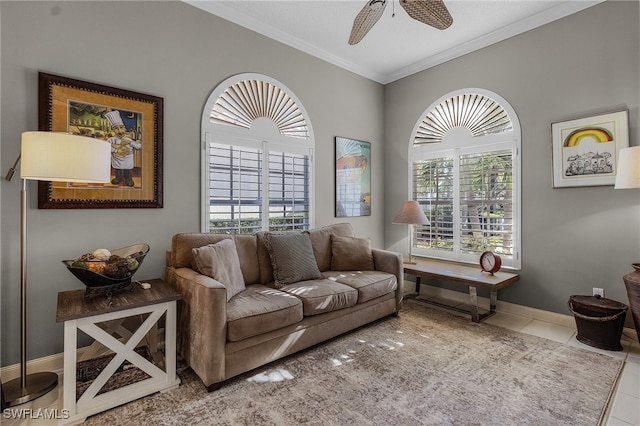 living room with tile patterned floors, ceiling fan, and crown molding