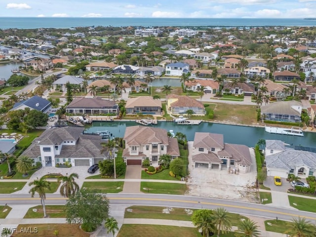 drone / aerial view featuring a water view