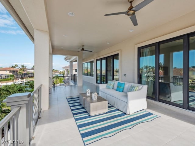 view of patio featuring outdoor lounge area and ceiling fan