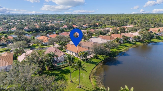 drone / aerial view with a water view