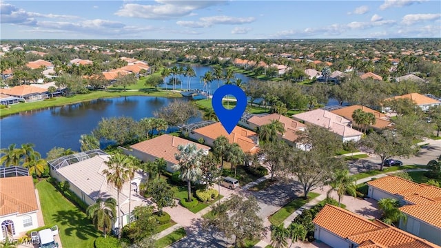 5051 Jarvis Ln, Naples, FL 34119 - aerial perspective of suburban area featuring a large body of water