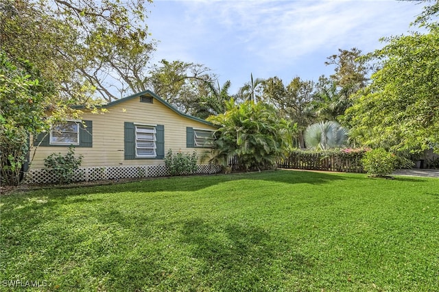 view of property exterior featuring a yard