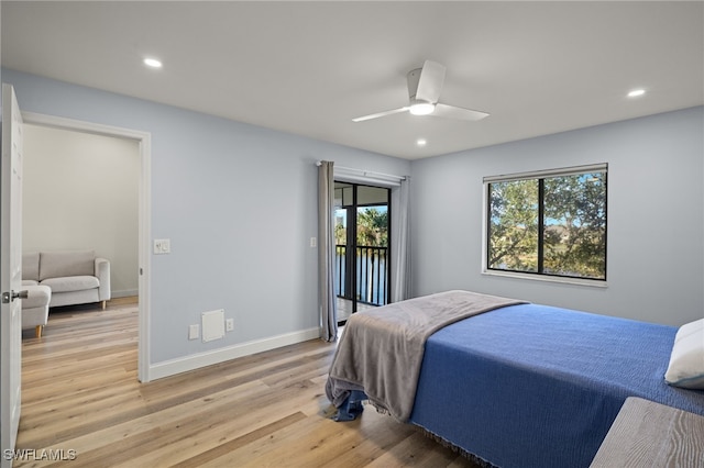 bedroom featuring access to exterior, ceiling fan, and light wood-type flooring