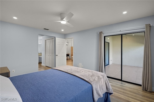 bedroom featuring ceiling fan and light hardwood / wood-style floors