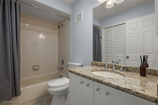 full bathroom featuring tile patterned flooring, vanity, shower / bath combination with curtain, and toilet