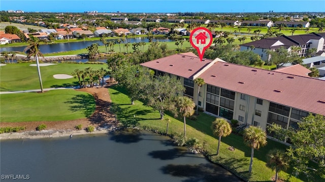 drone / aerial view with a water view