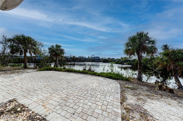 view of patio / terrace featuring a water view