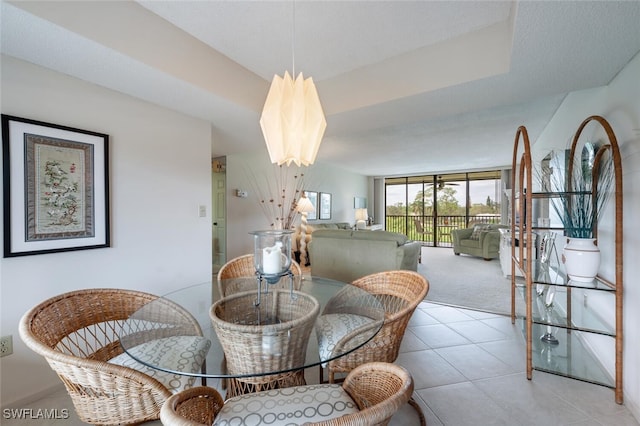 413 Augusta Blvd Unit 305, Naples, FL 34113 - carpeted dining area with baseboards