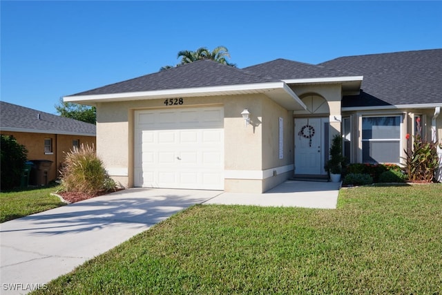 ranch-style home featuring a garage and a front yard