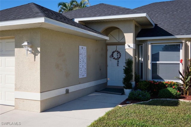 entrance to property with a garage