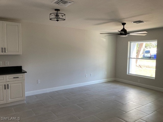 interior space featuring light tile patterned floors