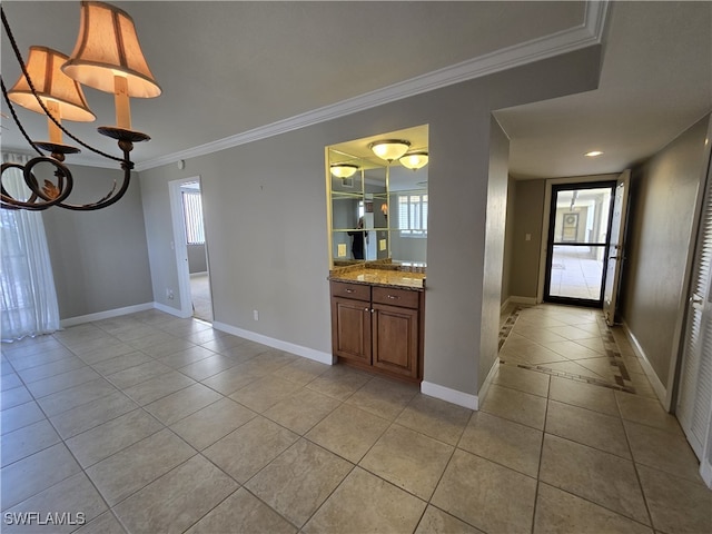 interior space featuring crown molding, plenty of natural light, and light tile patterned floors