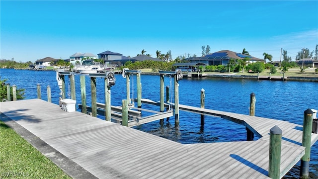 dock area featuring a water view