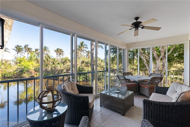 sunroom / solarium with a wealth of natural light and ceiling fan