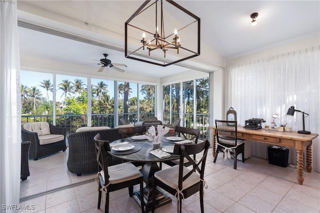 dining room with light tile patterned flooring and ceiling fan with notable chandelier