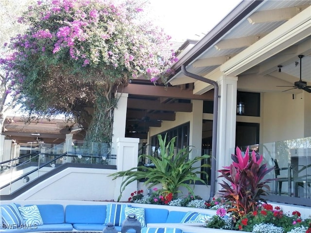 view of property exterior featuring ceiling fan