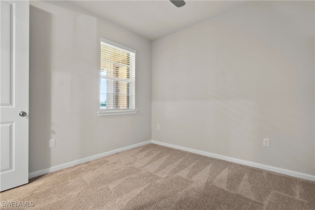 spare room with carpet flooring