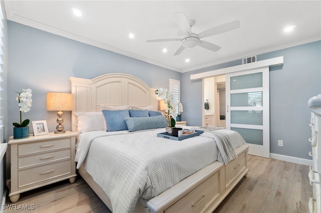 bedroom with light wood-type flooring, ceiling fan, and ornamental molding