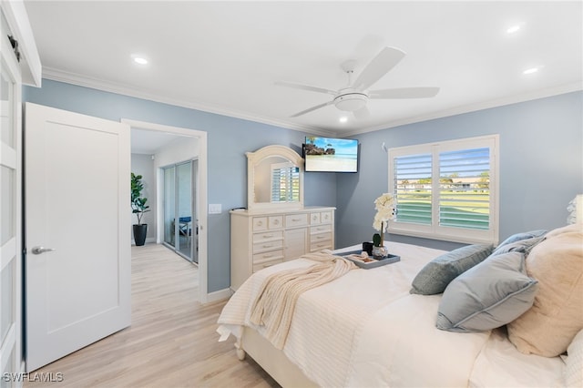 bedroom featuring ceiling fan, light hardwood / wood-style floors, and ornamental molding