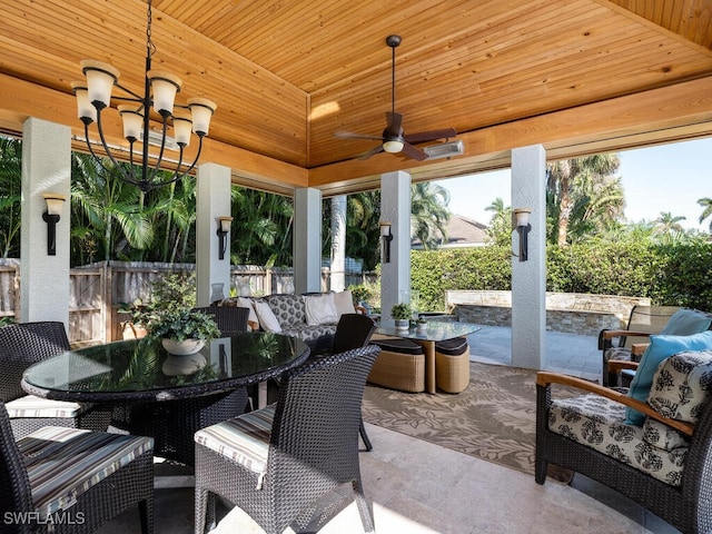 sunroom featuring wood ceiling and ceiling fan with notable chandelier