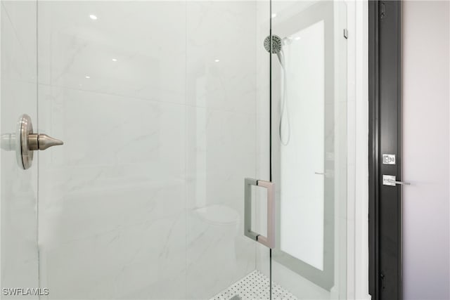 bathroom featuring walk in shower