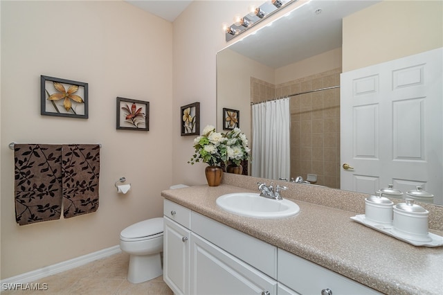 bathroom featuring toilet, vanity, tile patterned floors, and walk in shower