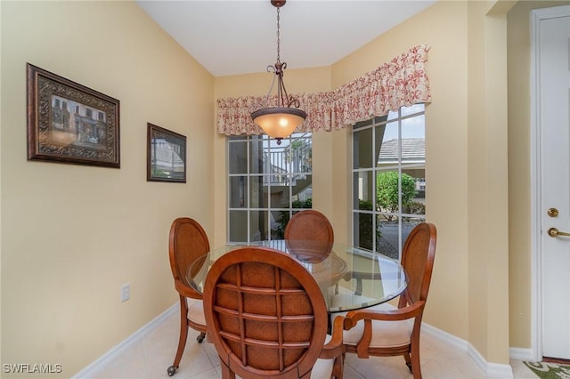 14531 Abaco Lakes Dr Unit 103, Fort Myers, FL 33908 - dining room with baseboards and light tile patterned flooring