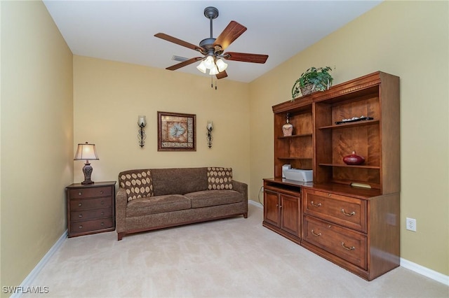 14531 Abaco Lakes Dr Unit 103, Fort Myers, FL 33908 - sitting room featuring a ceiling fan and light carpet