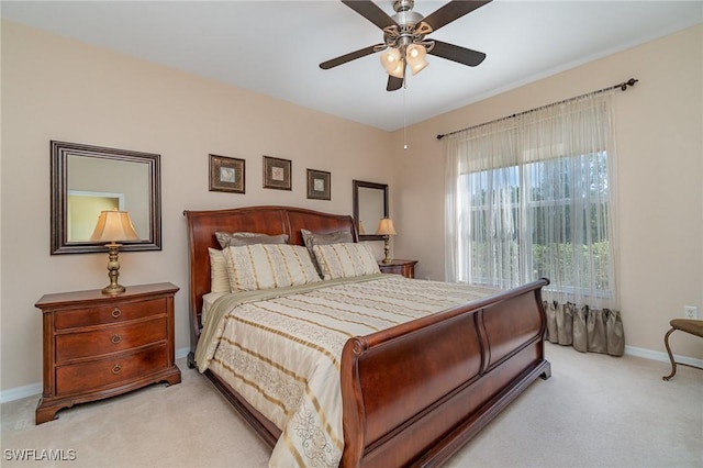 14531 Abaco Lakes Dr Unit 103, Fort Myers, FL 33908 - bedroom featuring light colored carpet and ceiling fan