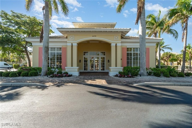14531 Abaco Lakes Dr Unit 103, Fort Myers, FL 33908 - doorway to property with french doors and stucco siding