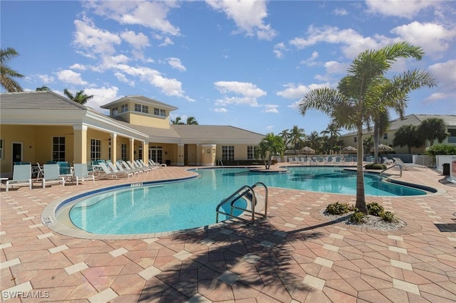 14531 Abaco Lakes Dr Unit 103, Fort Myers, FL 33908 - community pool featuring a patio