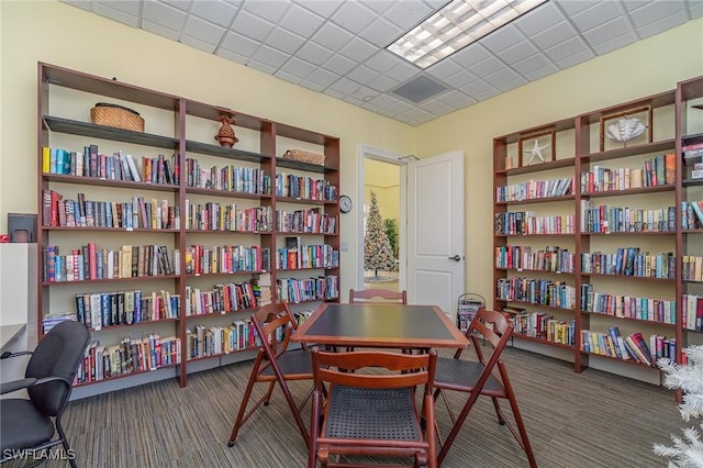 14531 Abaco Lakes Dr Unit 103, Fort Myers, FL 33908 - office area with carpet floors and bookshelves