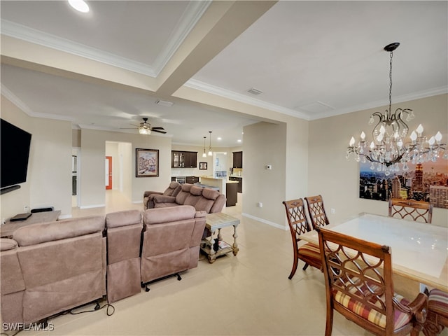 living room featuring ceiling fan with notable chandelier and ornamental molding