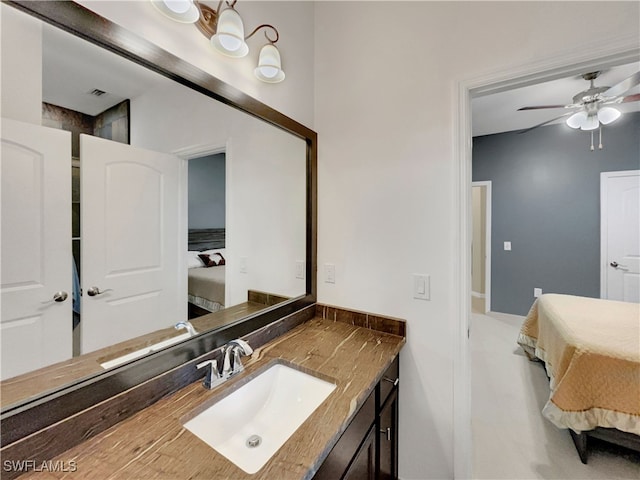 bathroom featuring vanity and ceiling fan