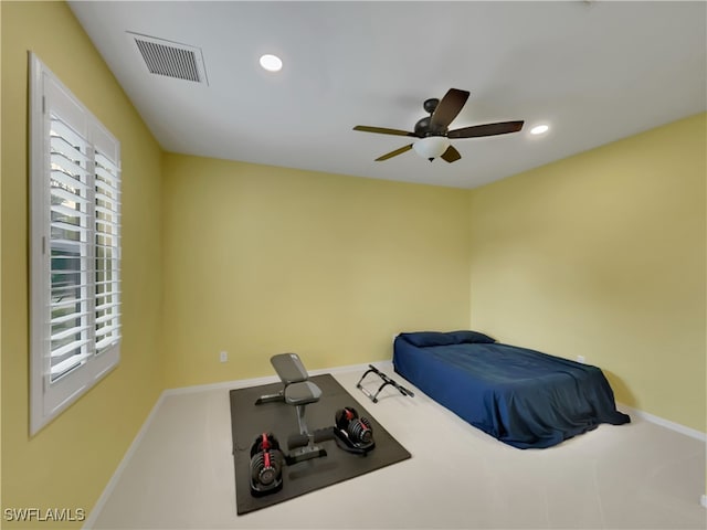 bedroom with ceiling fan and carpet floors