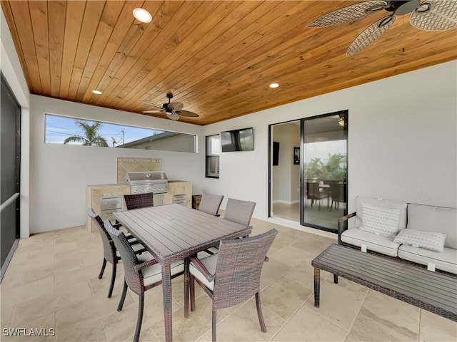 view of patio / terrace featuring ceiling fan and a grill