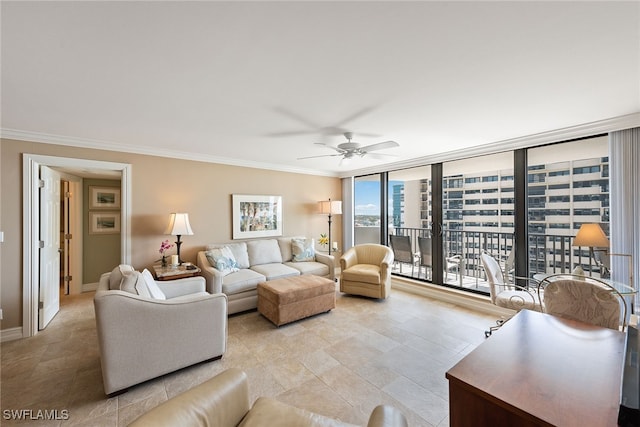 living room featuring ceiling fan, expansive windows, and ornamental molding