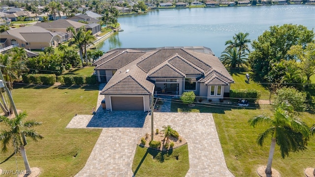 bird's eye view with a water view