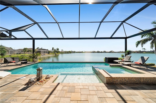 view of pool featuring an in ground hot tub, a patio, a water view, and a lanai