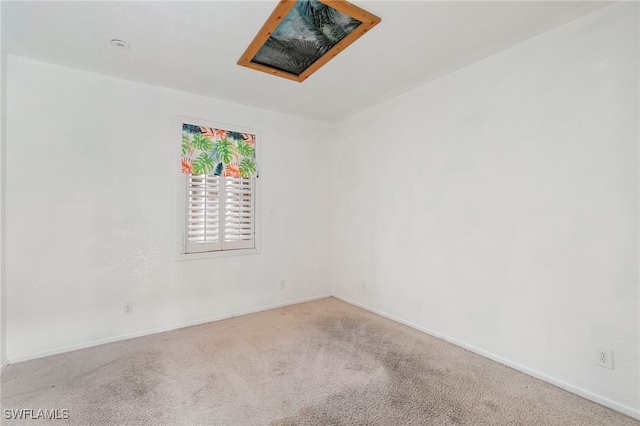 spare room with carpet flooring