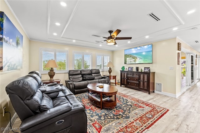 living room featuring ceiling fan, light hardwood / wood-style floors, and ornamental molding