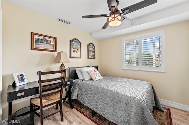 bedroom featuring ceiling fan and light hardwood / wood-style flooring