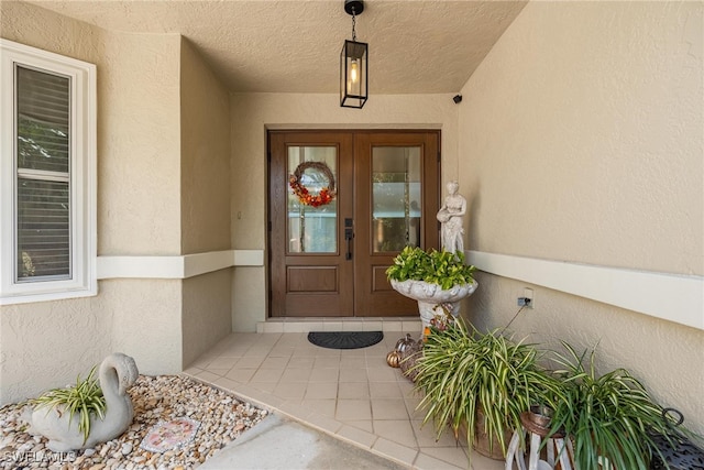 view of exterior entry with french doors