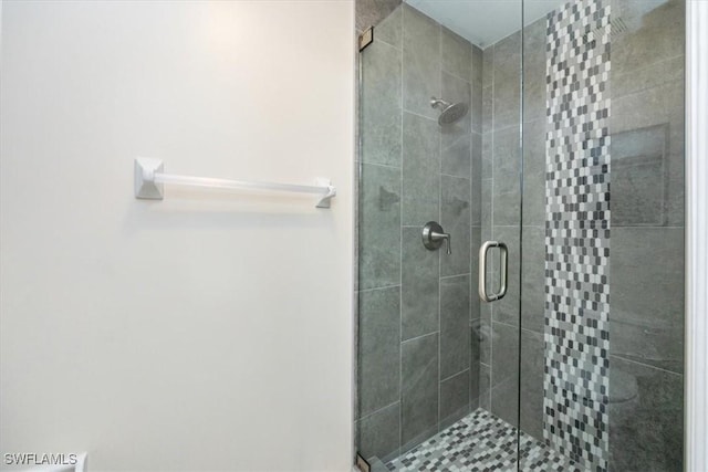 bathroom featuring a shower stall