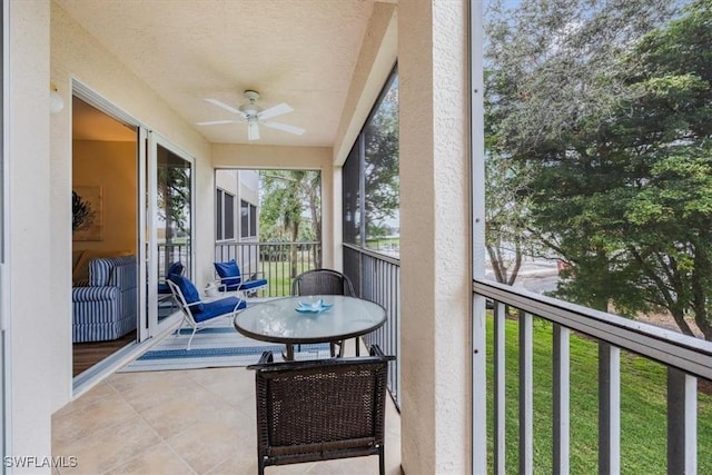 balcony featuring a ceiling fan