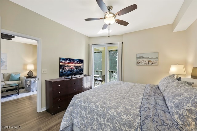 bedroom featuring baseboards, ceiling fan, wood finished floors, and access to exterior