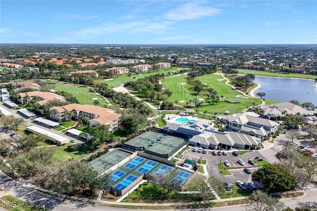 birds eye view of property featuring a water view and golf course view