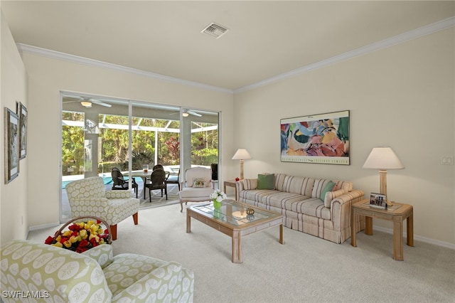 carpeted living room featuring ornamental molding