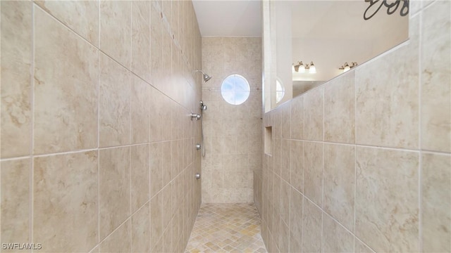 bathroom featuring a tile shower