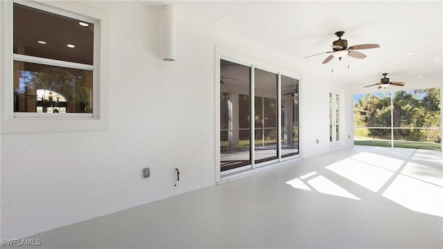 view of patio / terrace featuring ceiling fan